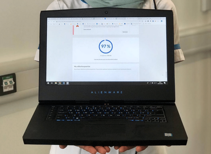 Clinical performance score displayed on laptop